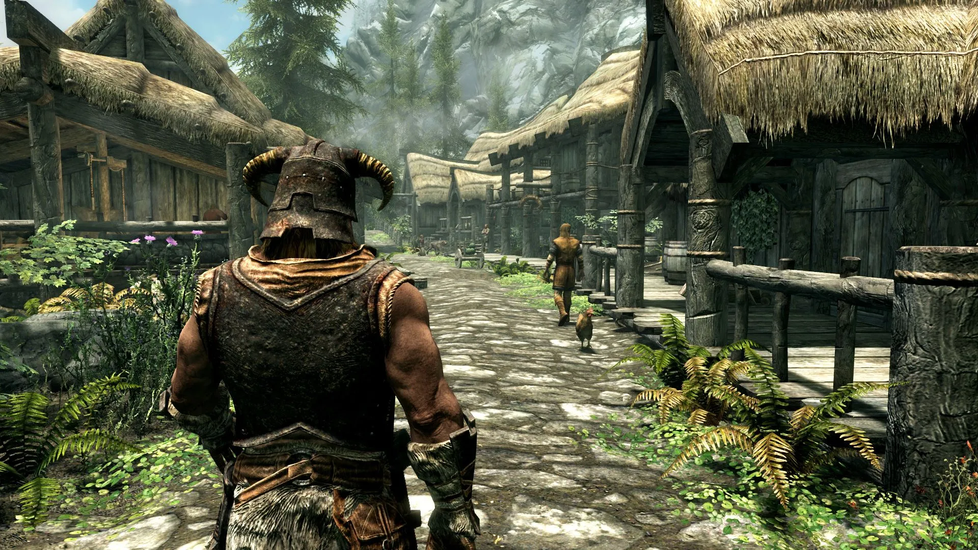 Cảnh quan ấn tượng của thế giới Skyrim với núi non và bầu trời huyền ảo.