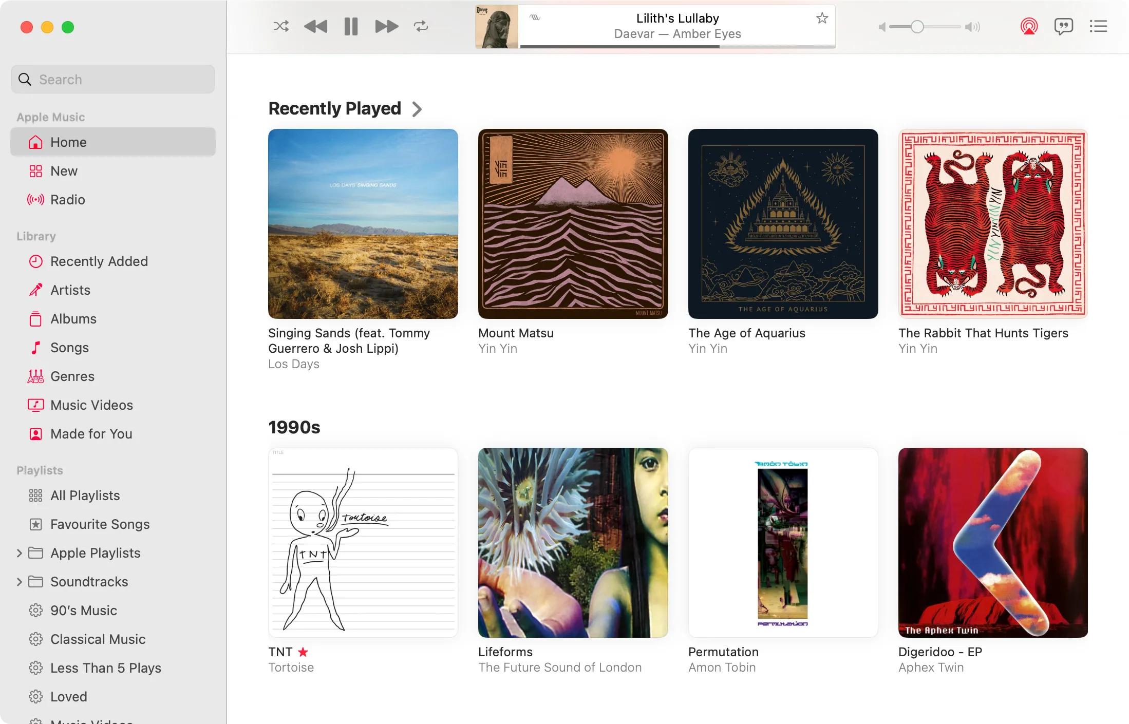 Giao diện màn hình chính Apple Music trên macOS với các mục "Đã Phát Gần Đây" và "Thập niên 1990"