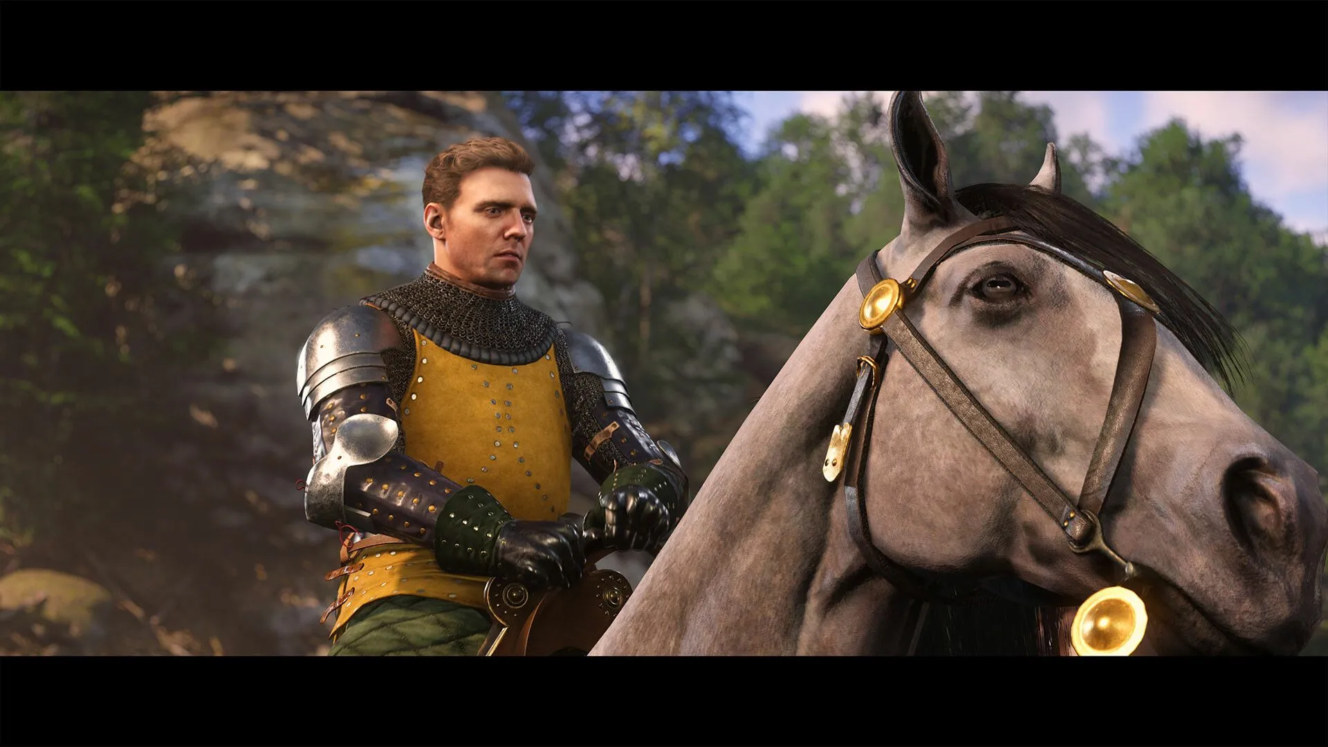 Hình ảnh người lính Henry cùng chú ngựa Pebbles đồng hành trong thế giới mở rộng lớn của Kingdom Come: Deliverance II
