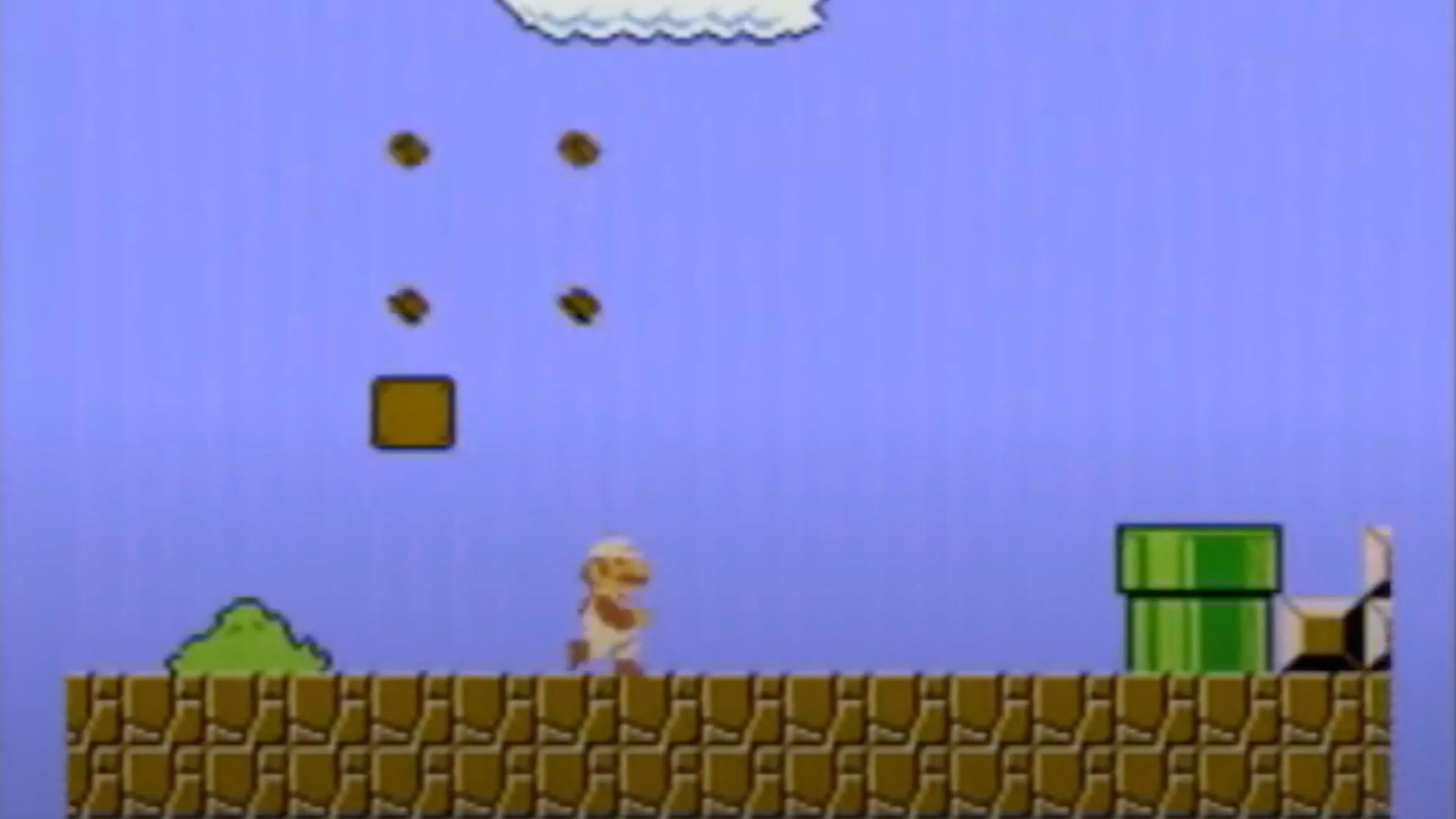Mario trong tư thế nhảy qua một khoảng trống lớn trong Super Mario Bros., một yếu tố gameplay cốt lõi của dòng game platformer.