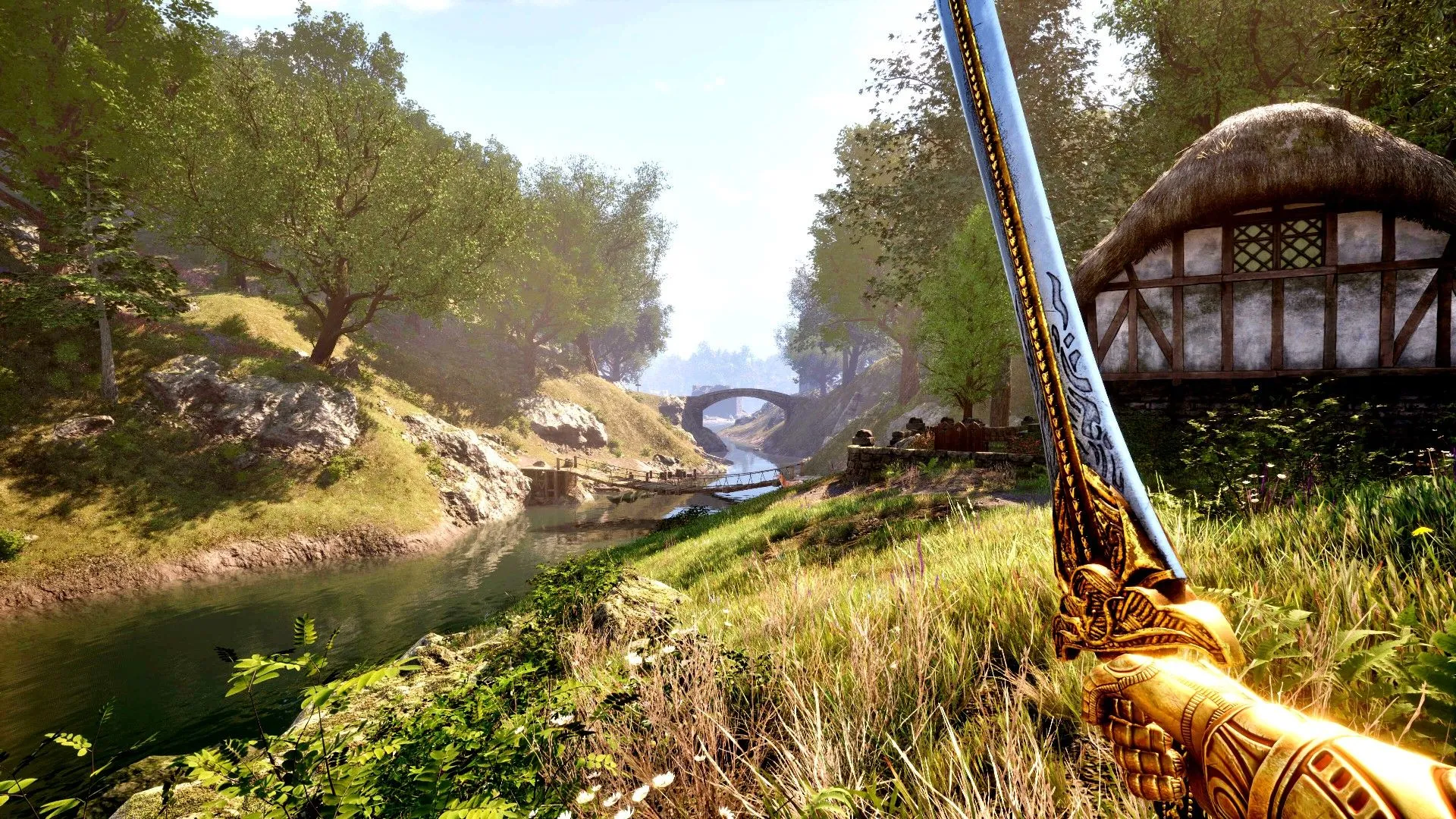 Người chơi cầm kiếm nhìn ra sông cạnh ngôi nhà trong The Elder Scrolls IV Oblivion Remastered.