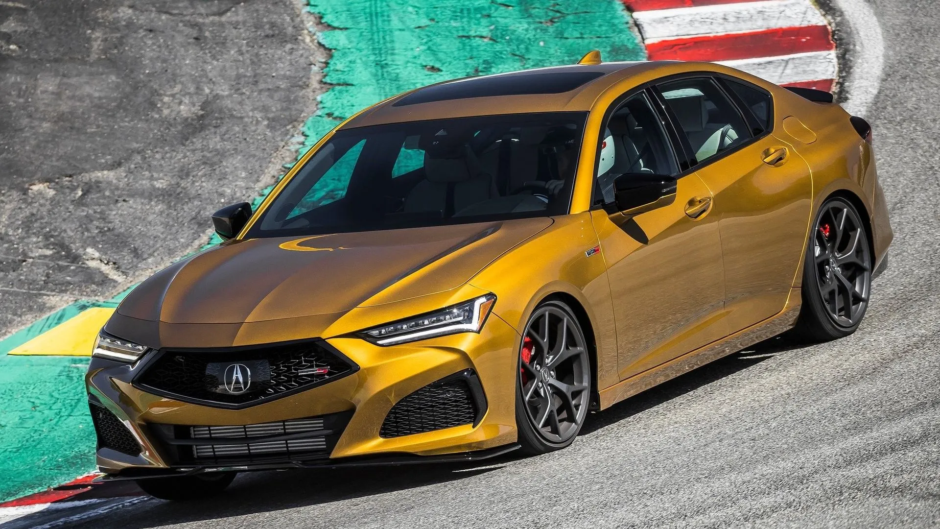 Acura TLX Type S 2021 màu đen tuyền đang di chuyển trên đường, với thiết kế năng động và hiệu suất vượt trội từ động cơ V6 tăng áp