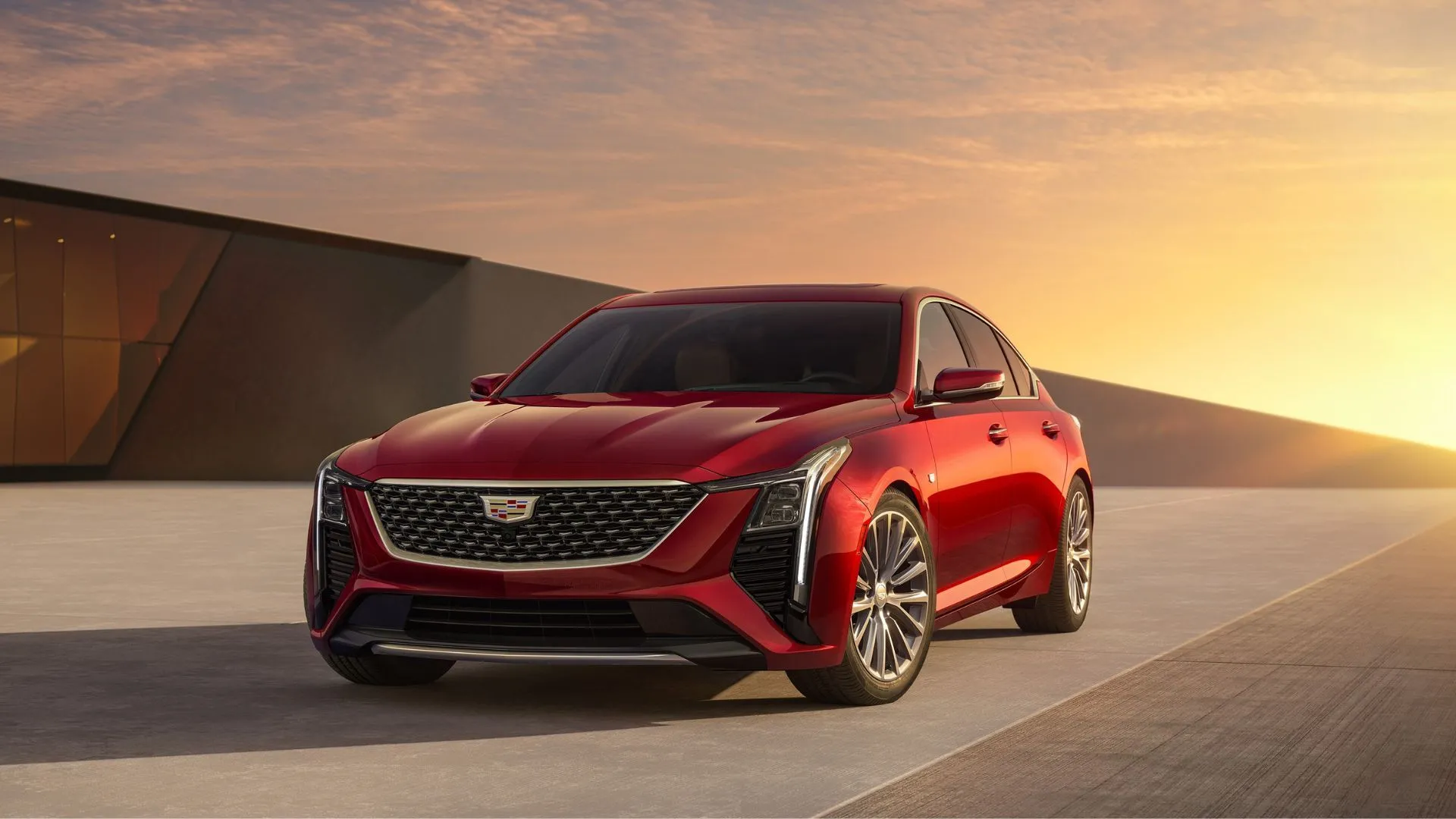 Cadillac CT5 2025 màu đỏ sang trọng dưới ánh hoàng hôn, mẫu sedan hạng sang Mỹ nổi bật với độ bền