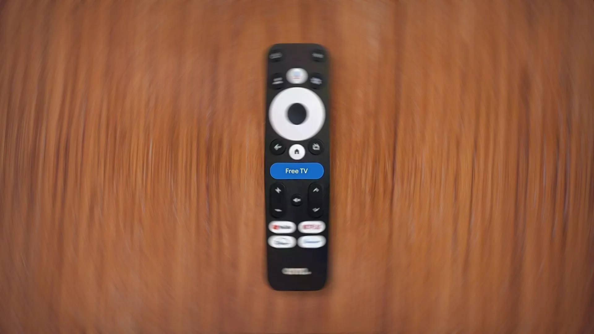Điều khiển từ xa Google TV với nút &quot;Free TV&quot; nổi bật ở giữa, minh họa yêu cầu mới của Google