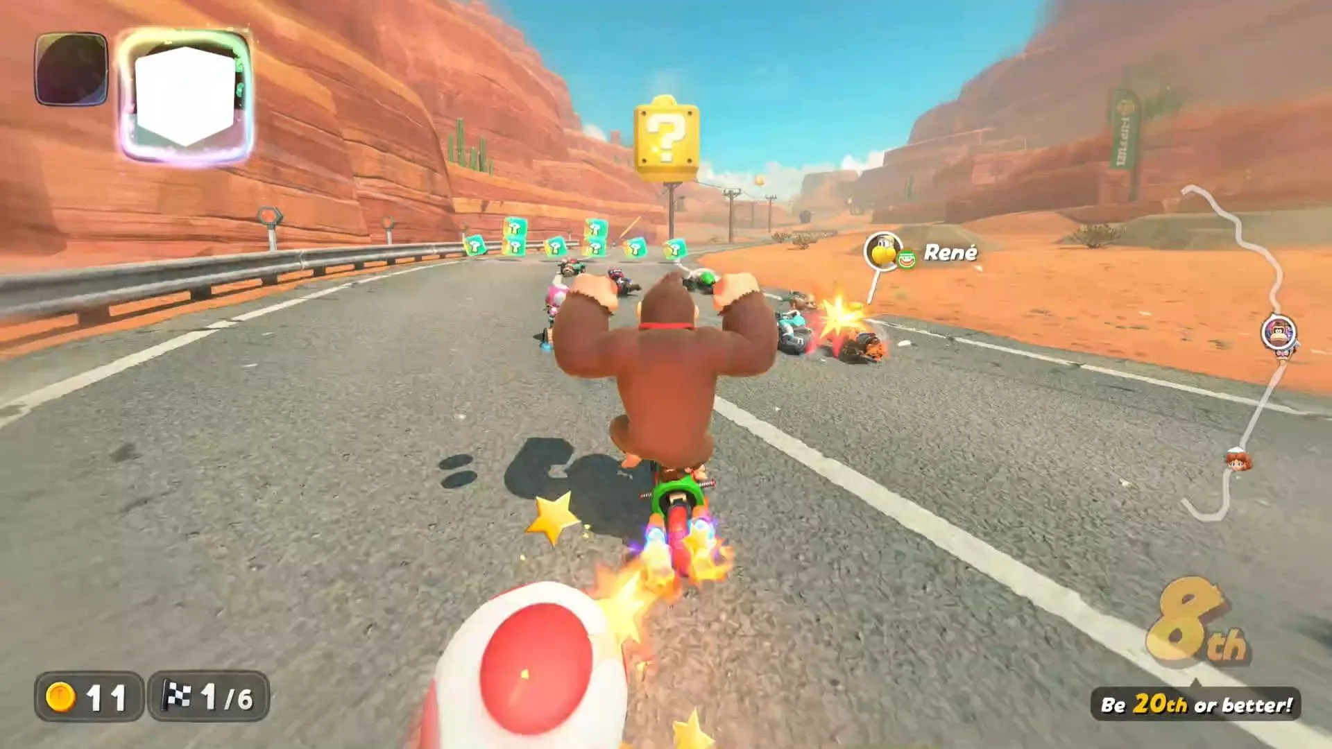 Donkey Kong sử dụng vật phẩm Khối Hỏi (Question Block) trong Mario Kart World