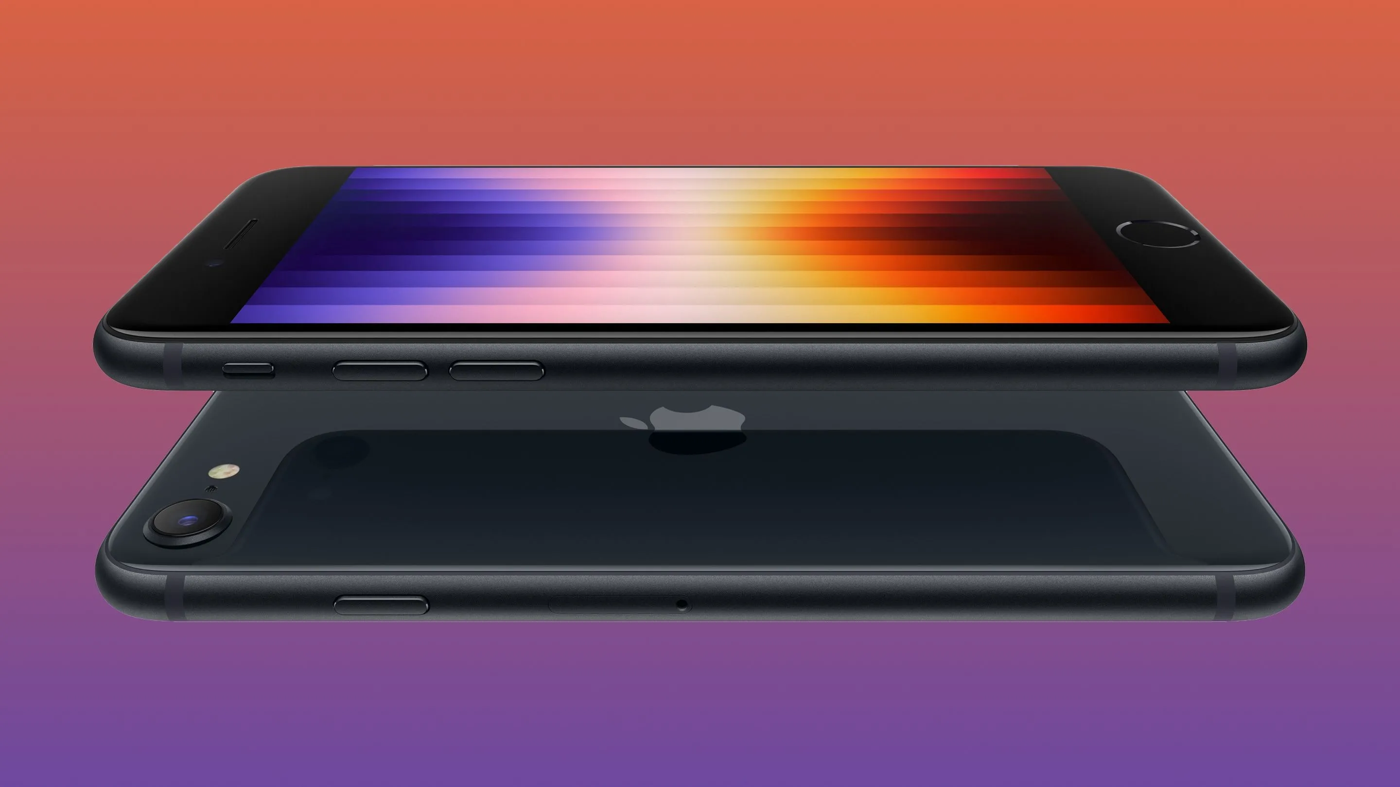 Hai chiếc iPhone SE thế hệ thứ ba (2022) màu đỏ và trắng, xếp chồng lên nhau.