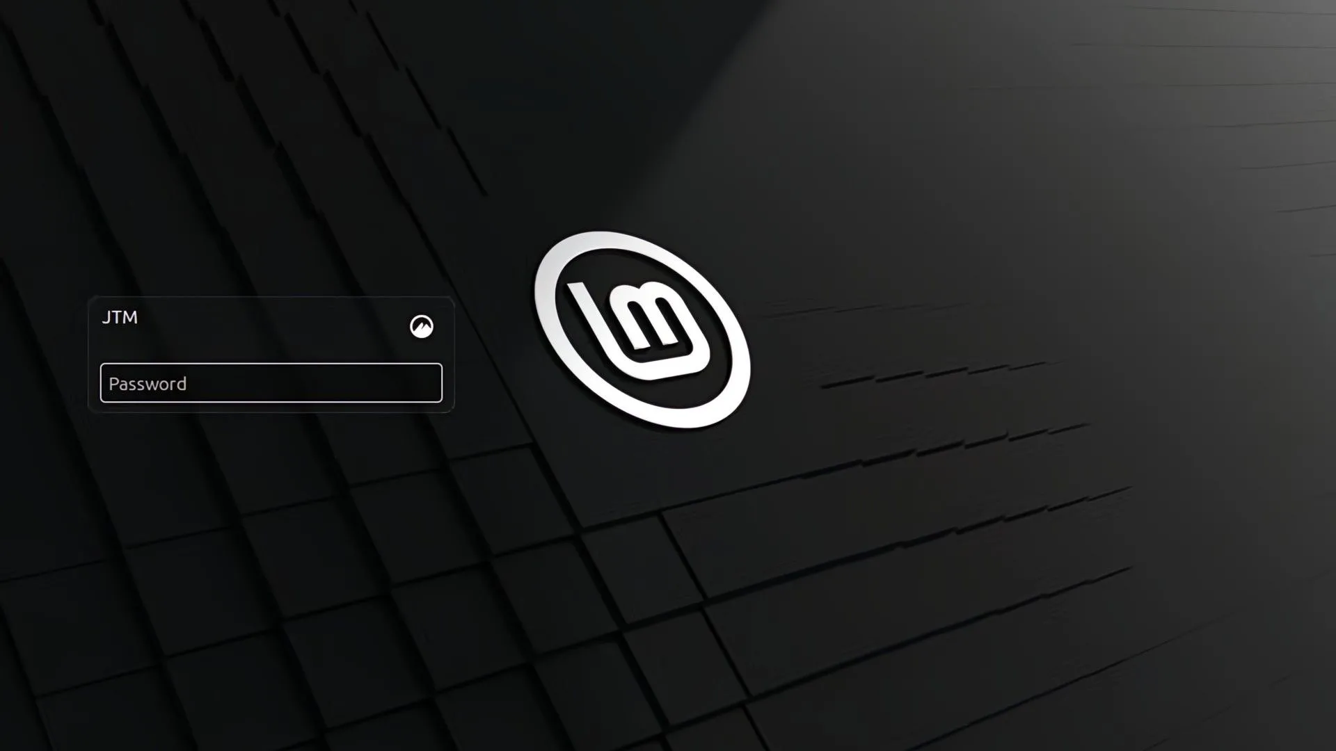 Màn hình đăng nhập ban đầu của hệ điều hành Linux Mint Cinnamon, thể hiện giao diện thân thiện với người dùng mới.