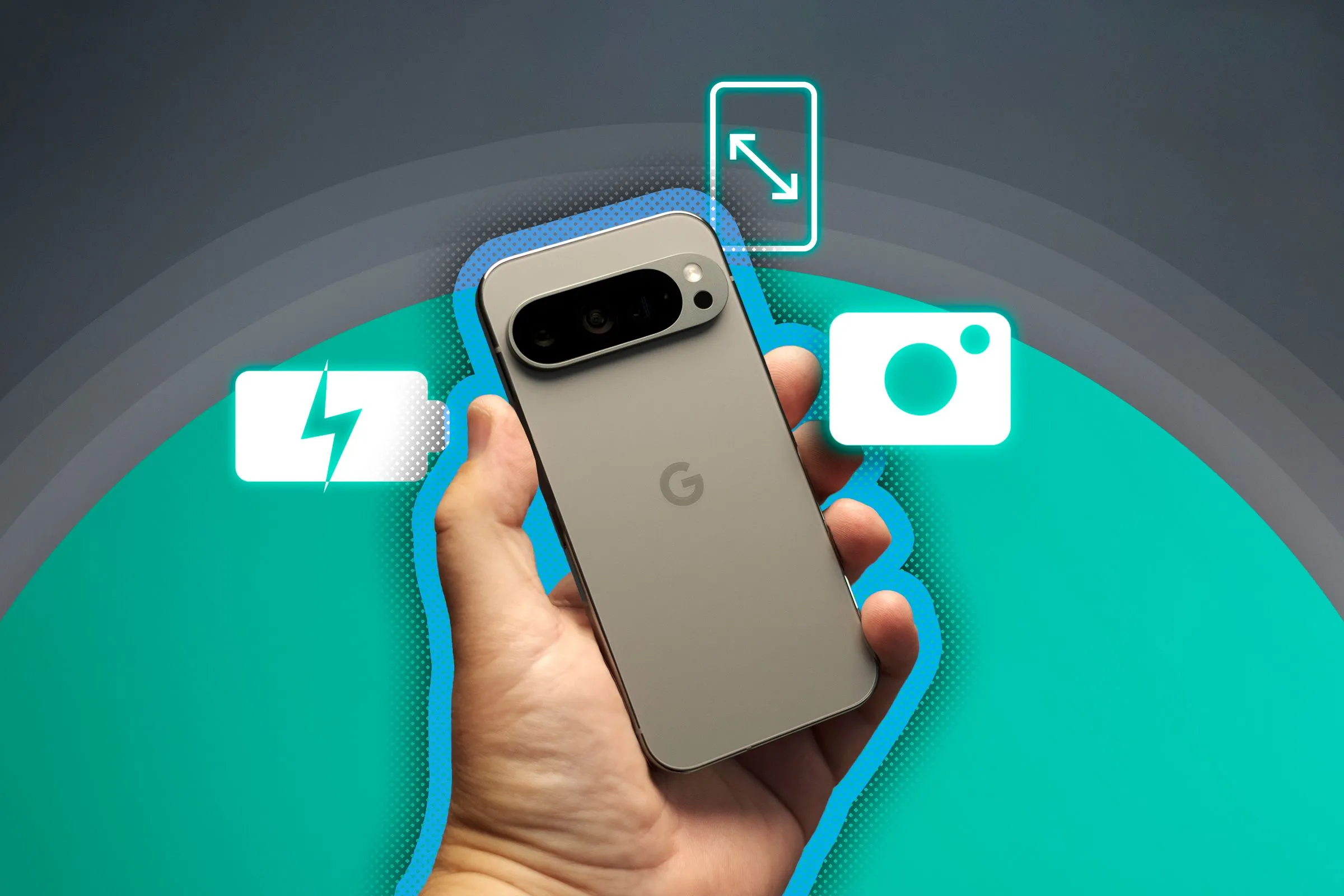 Một bàn tay đang cầm điện thoại Google Pixel 9 Pro với các biểu tượng làm nổi bật pin, camera và kích thước màn hình