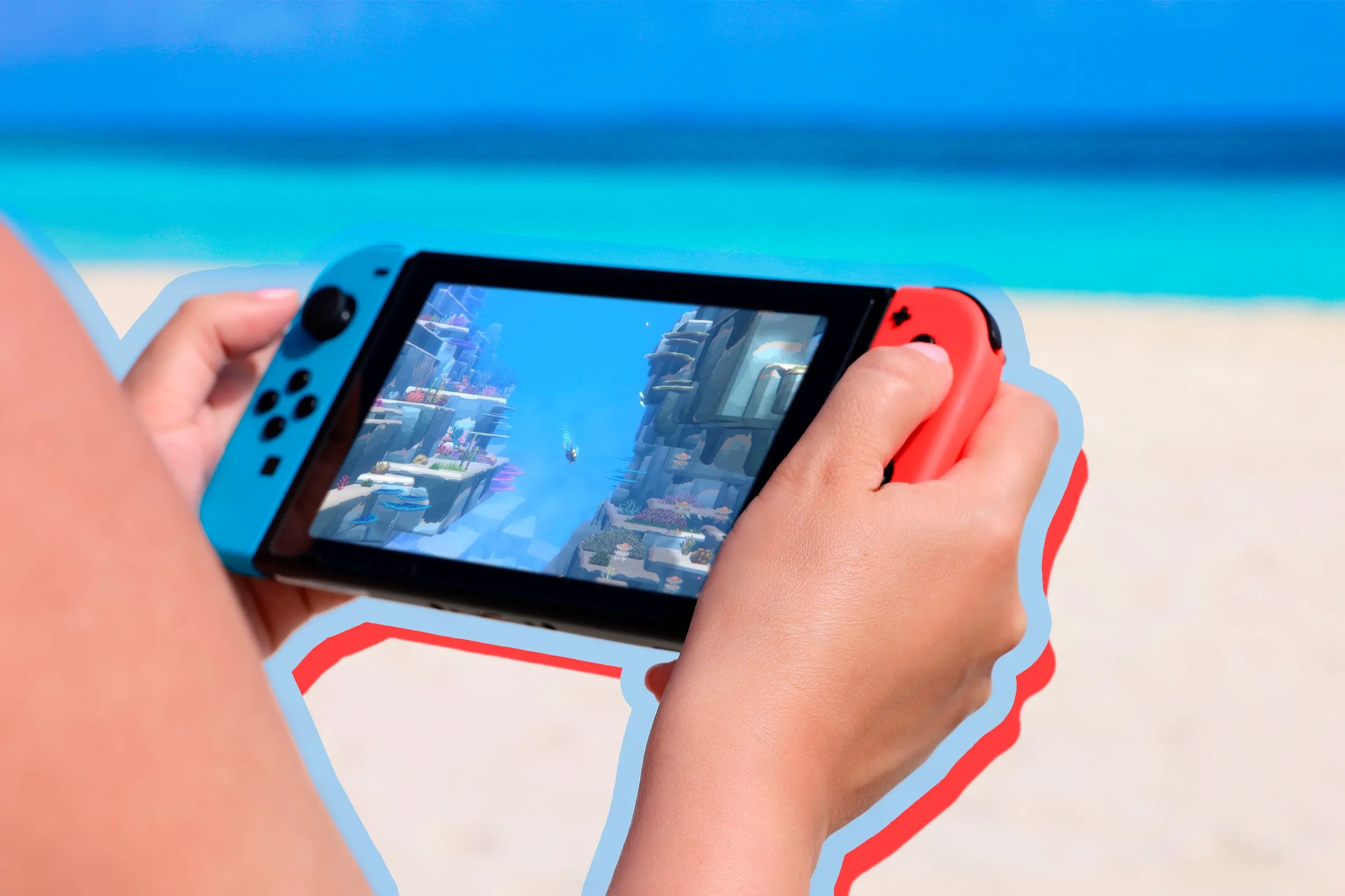 Một người đang chơi game trên Nintendo Switch tại bãi biển