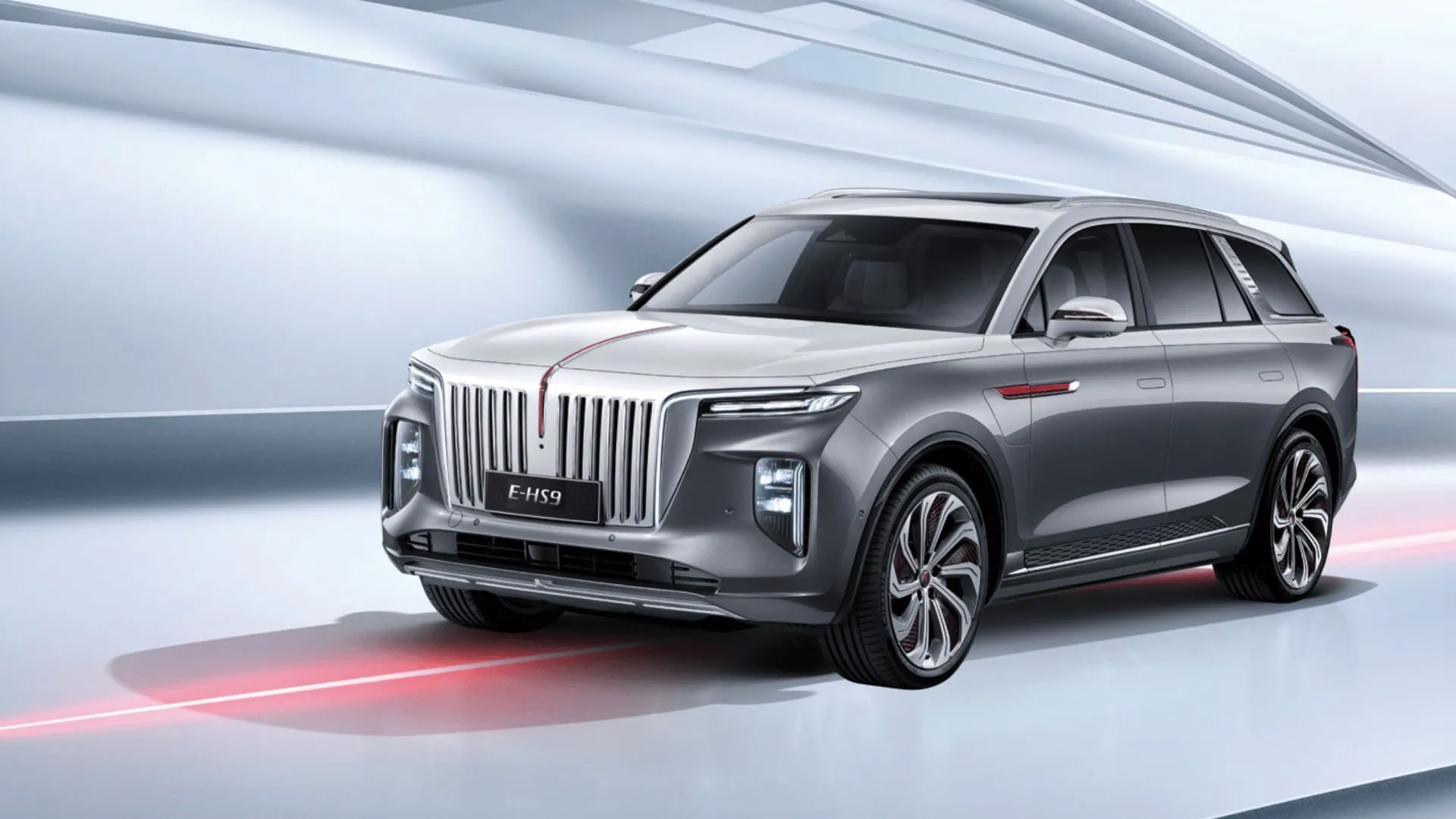 SUV điện hạng sang Hongqi E-HS9 màu xám được chụp trong studio, với thiết kế gợi nhớ Rolls-Royce Cullinan và sự sang trọng bậc nhất.