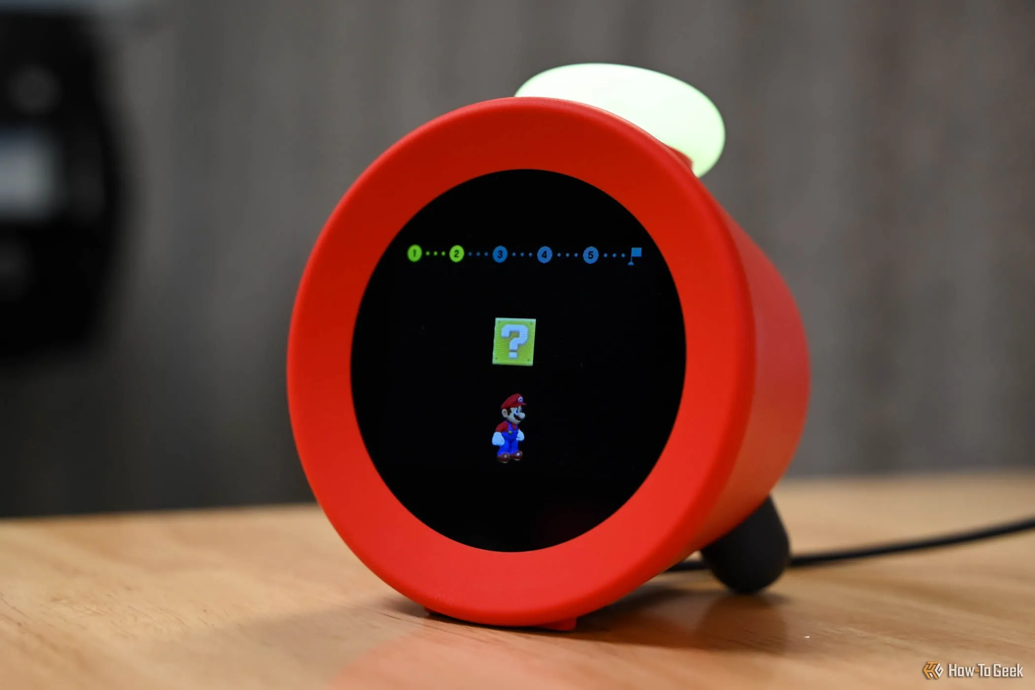 Thiết lập các tùy chọn trên đồng hồ báo thức Nintendo Alarmo
