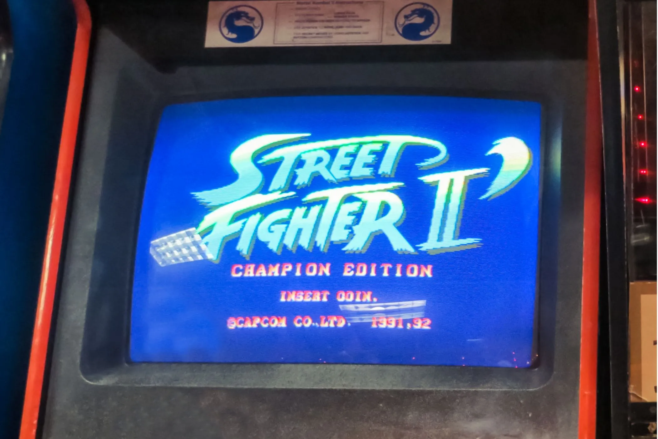 Thùng máy arcade của Street Fighter II Champion Edition, một tựa game đã định hình và đưa thể loại đối kháng lên tầm cao mới.