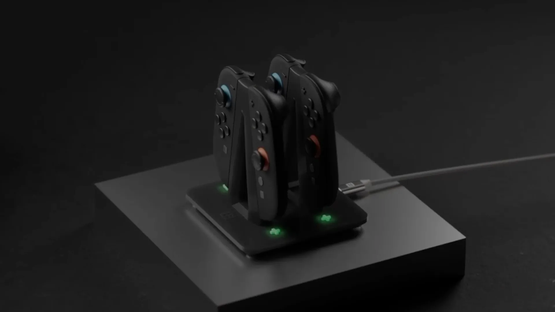 Bốn Joy-Con của Switch 2 trên đế sạc, theo mockup của Genki