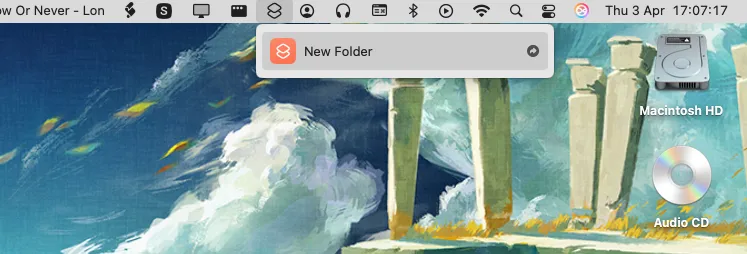 Thanh menu macOS hiển thị biểu tượng ứng dụng Phím tắt (Shortcuts) với menu thả xuống, bao gồm phím tắt &quot;Tạo Thư Mục Mới&quot; sẵn sàng để kích hoạt.
